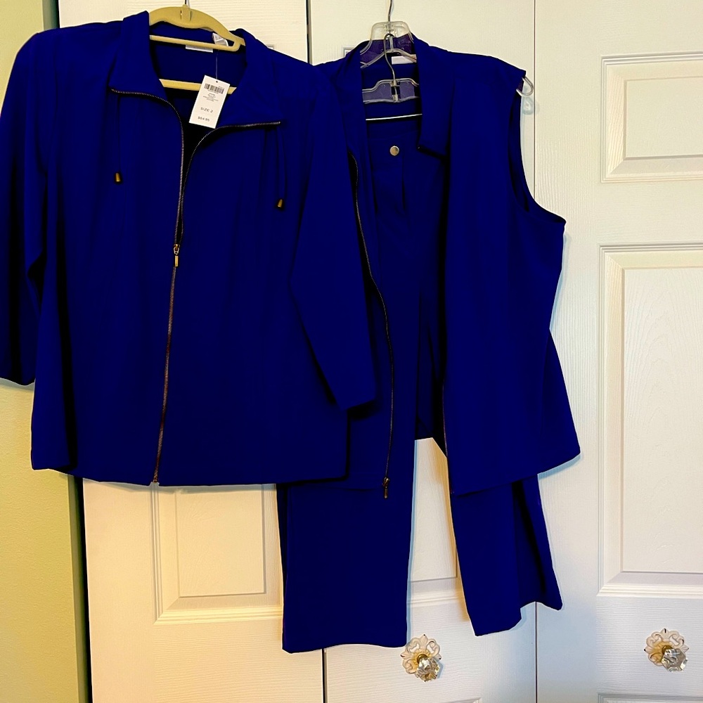 Chicos size 2, with a three jacket